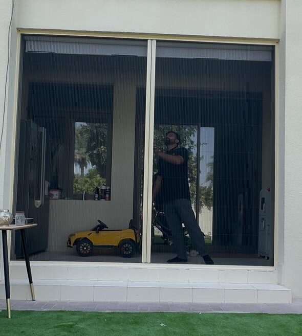 Commercial mosquito screen on a hotel restaurant door in Dubai
