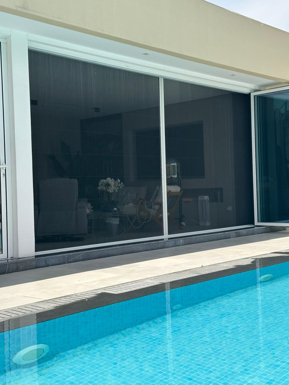 Stainless marine-grade screens on a beachfront villa in Palm Jumeirah, Dubai