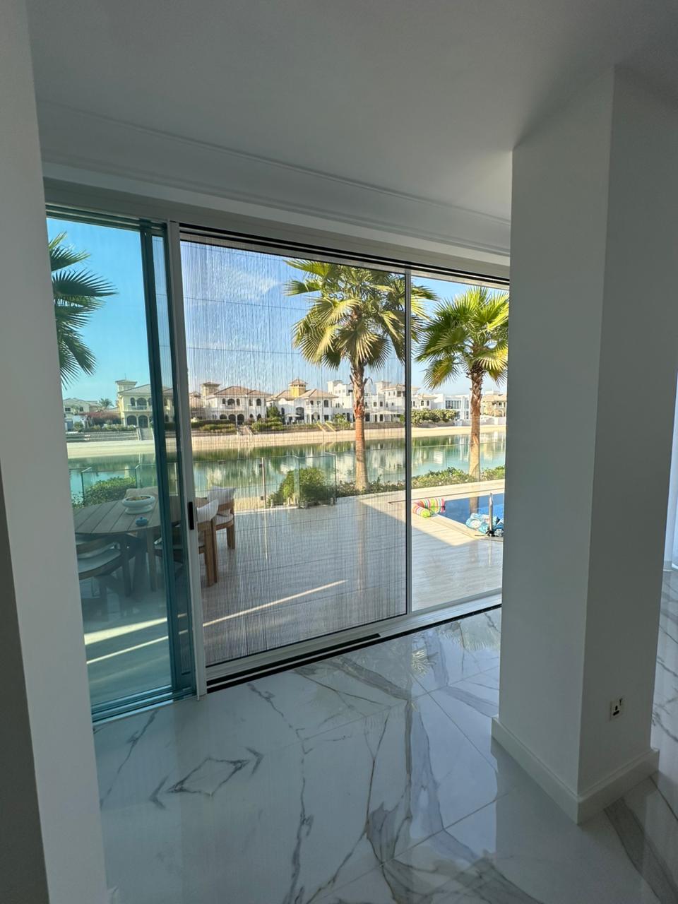 Sliding mosquito screen on a Dubai apartment window