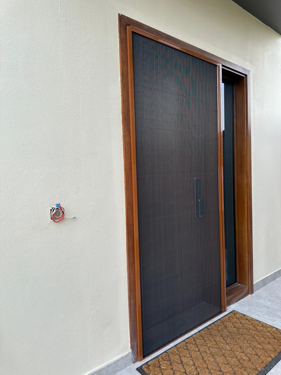 Magnetic door screen on an Al Qusais kitchen door